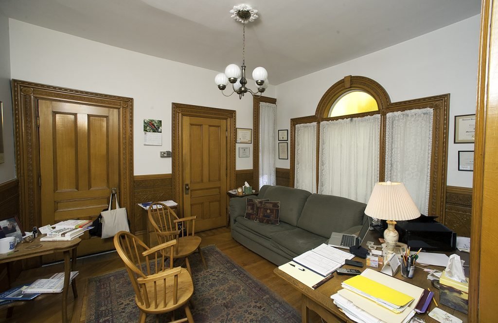 The former dining room now serves as a consulting area.